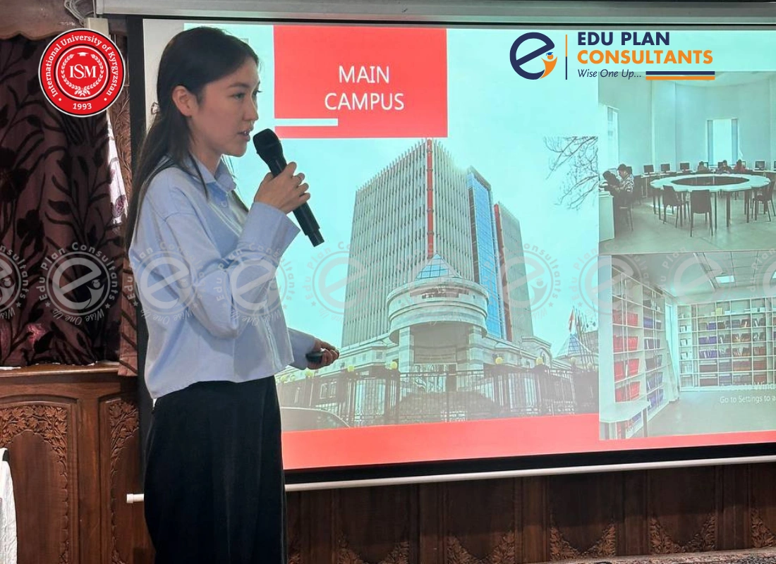 At the Edu Plan Consultants event in Kashmir, a university delegate gives students a virtual tour of campus life at the International University of Kyrgyzstan.
