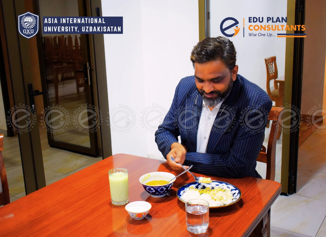 MD of Edu Plan Consultants enjoying the fantastic hostel food at Asia International University. A great way to experience student life firsthand.