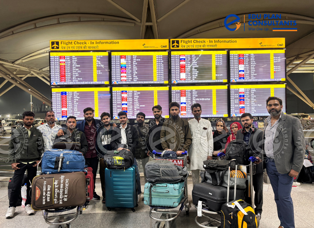 Managing Director of EduPlan Consultants sharing final moments of guidance with students before their departure to Uzbekistan.